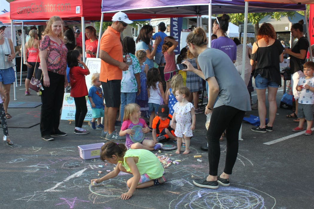 Kids playing with Chalk at Circle C's April Food Truck Night